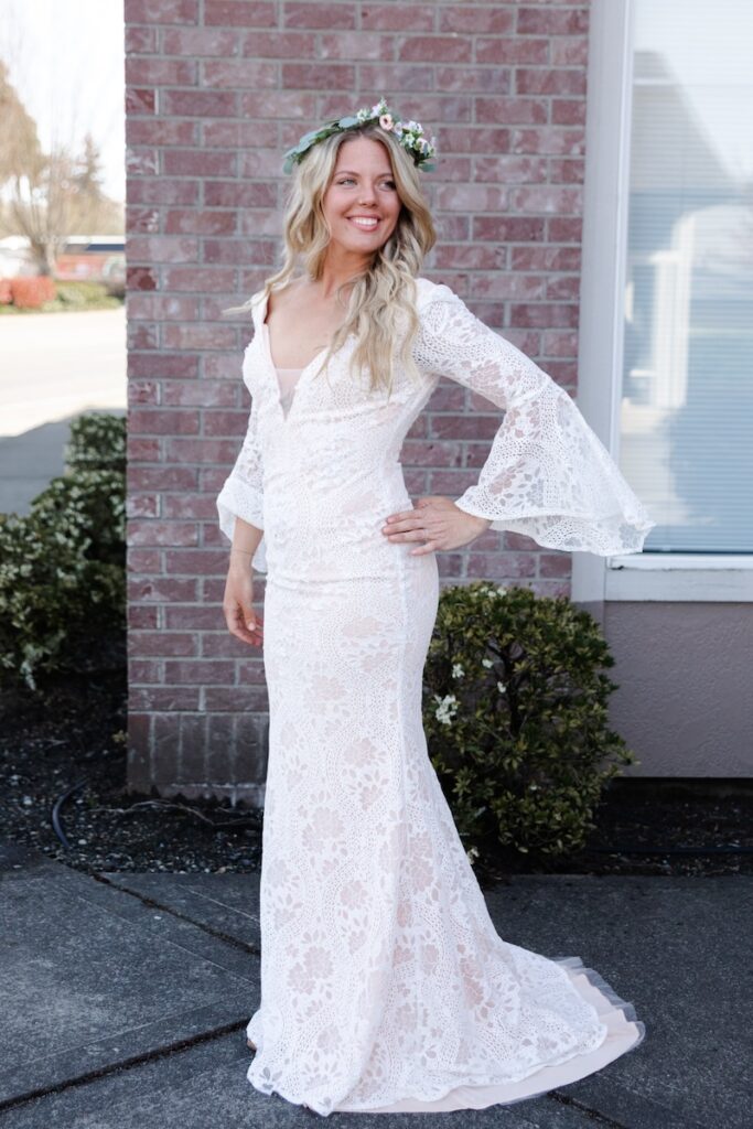 Bohemian style wedding dress, column fit, v-neckline, bell sleeves. Weddings With Joy. 