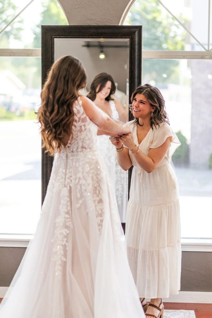 Bride in romantic, floral lace detailed and sparkle wedding dress. Weddings with Joy. 