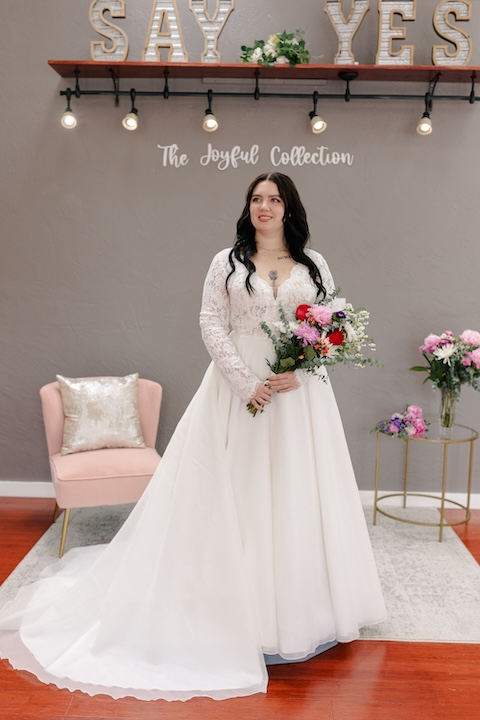 Romantic plus size wedding dress with lace long sleeves. Weddings with Joy. 