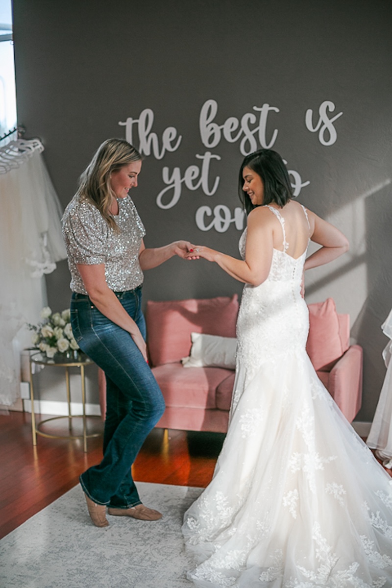 bride in lace fit to flare wedding dress with straps. weddings with joy. 