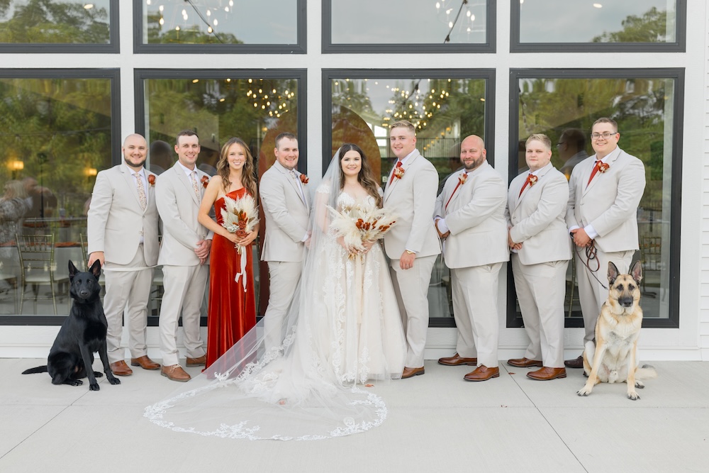 Boho autumn wedding style, traditional wedding party portrait, bride in lace ball gown. Weddings with Joy. 