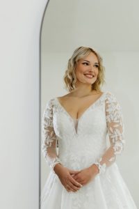 smiling bride in white bridal dress